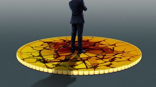 Illustration of a business person standing on a crumbling bitcoin.